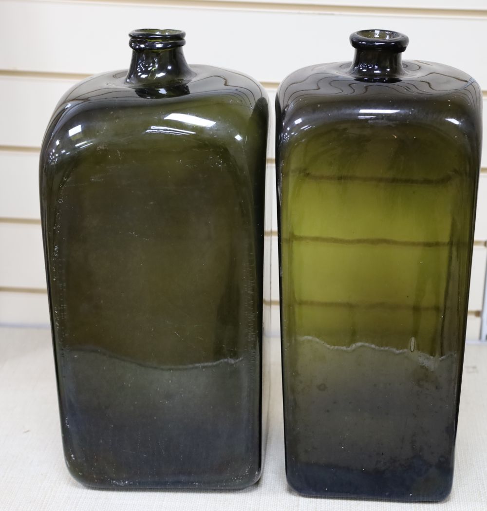 Two green glass carboys